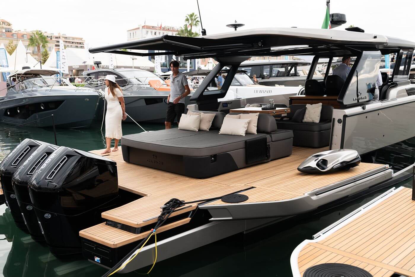 Illuminated beach area of a Cranchi yacht at night